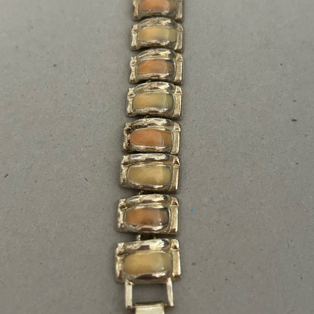Women’s vintage bracelet. Yellow and orange gemstones on gold tone
